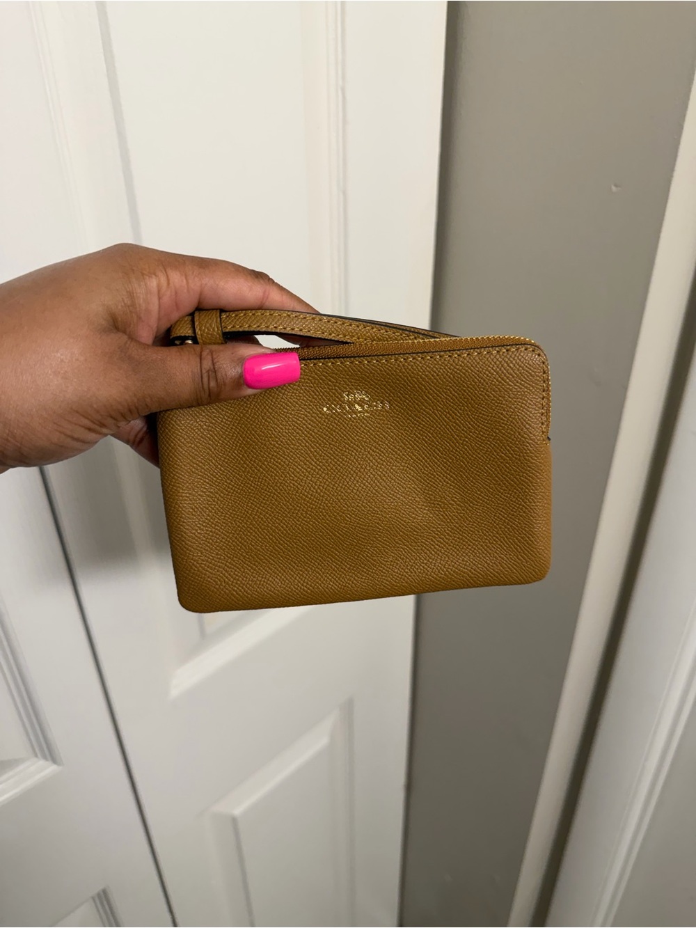 Coach Pebbled Leather Wristlet in Tan